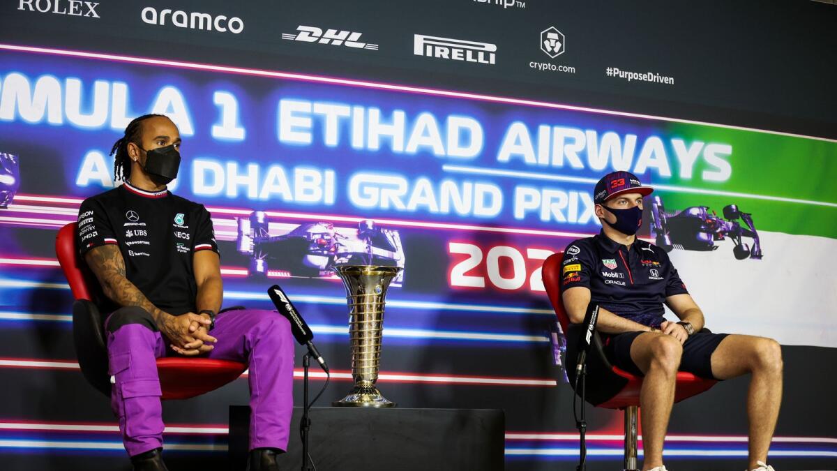 Mercedes driver Lewis Hamilton (left) and Red Bull driver Max Verstappen during a press conference ahead of the Formula One Abu Dhabi Grand Prix on Thursday. (AP)