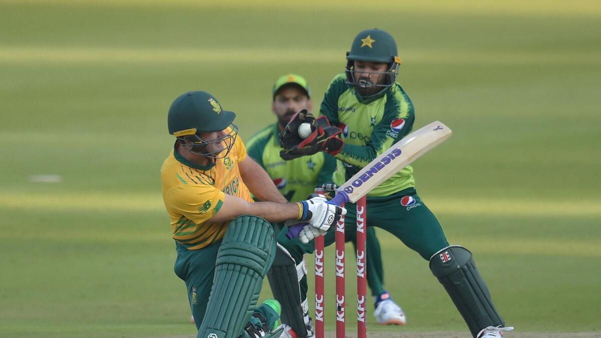 South Africa's Pite van Biljon (left) is caught out by Pakistan's Mohammad Rizwan during the second Twenty20 match against Pakistan. — AFP