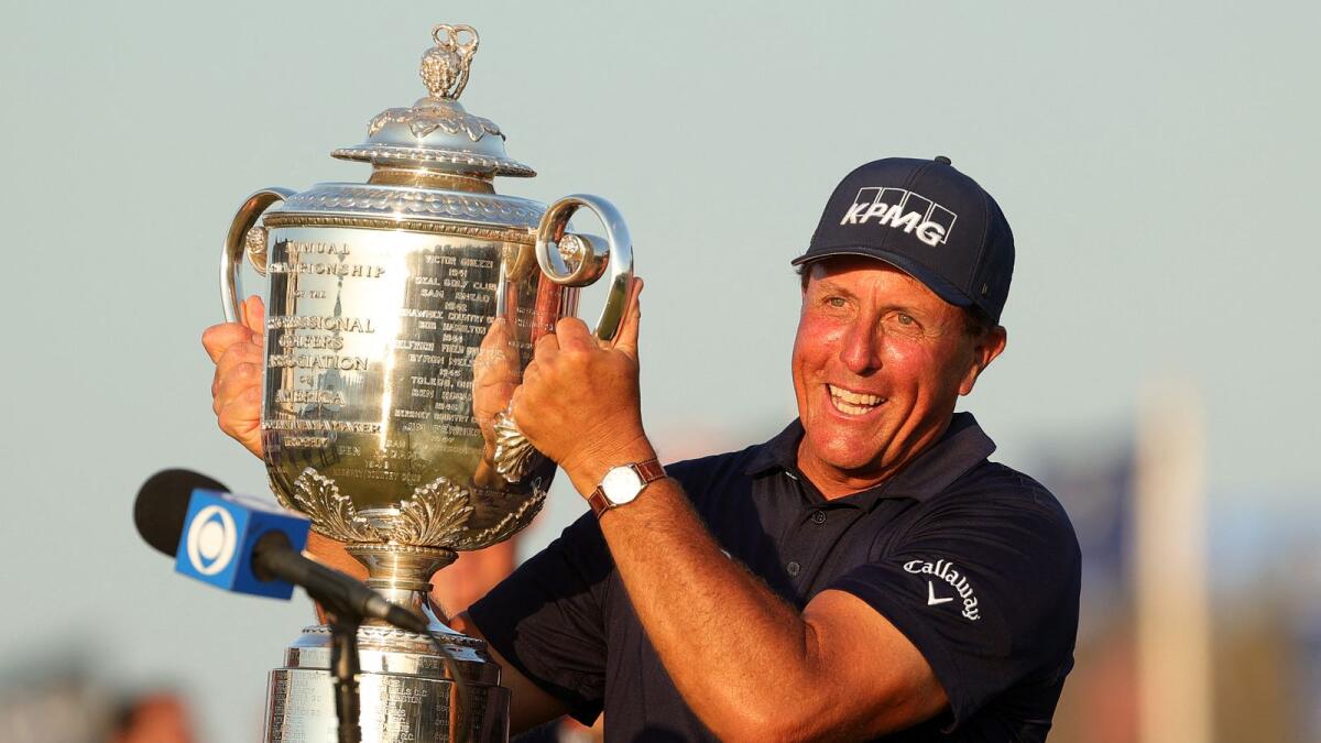 Phil Mickelson of the United States celebrates after winning the PGA Championship. (AFP)