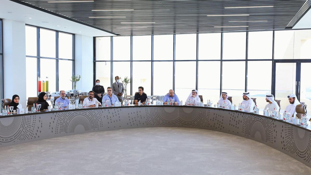 Saeed Mohammed Al Tayer was briefed by Shuaa Energy 3 officials, on the progress made in the second and third projects of the fifth phase of the solar park. — Supplied photo