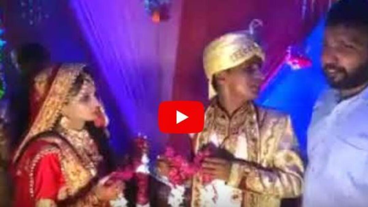 Video: Bride slaps wedding guest when he tries to lift her