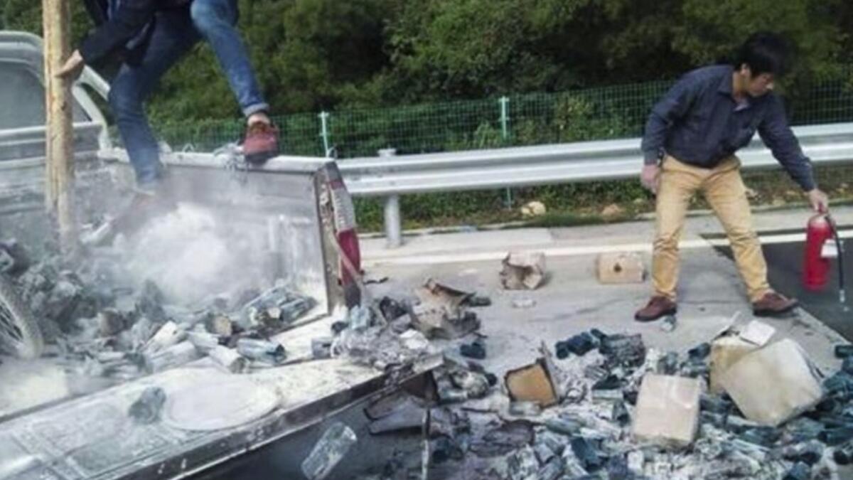 Driver throws cigarette butt, sets own truck on fire 