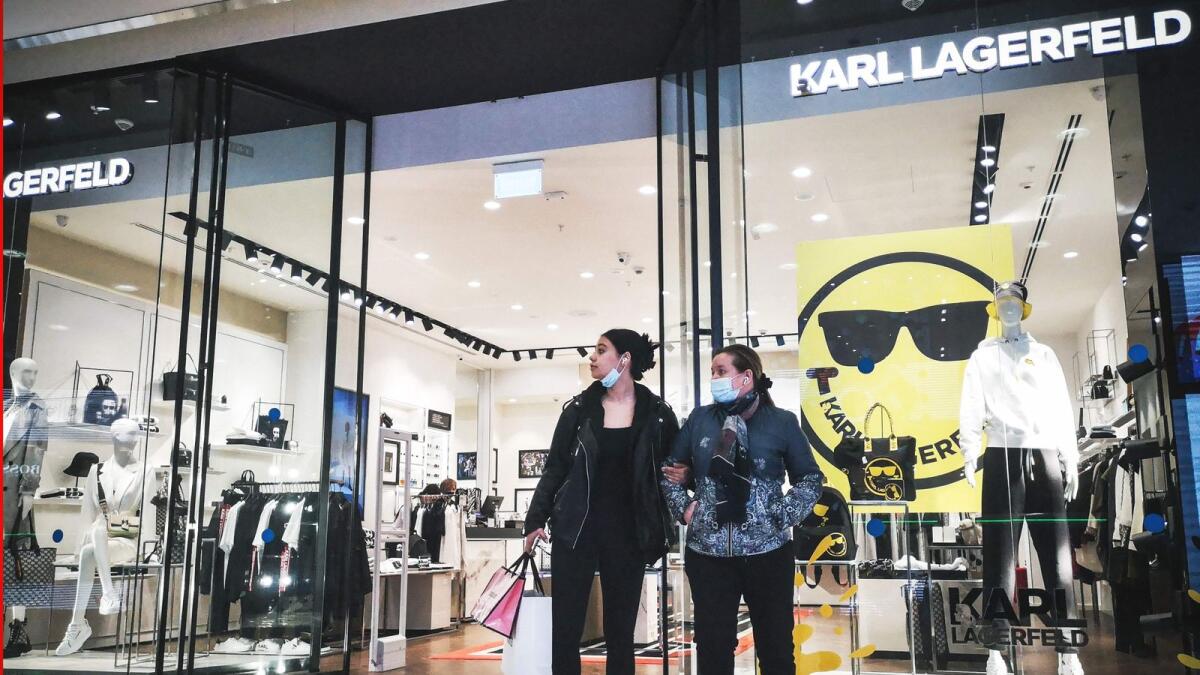 Customers exit German Karl Lagerfeld's shop in Evroreisky (European) shopping mall in Moscow. — AFP file photo 