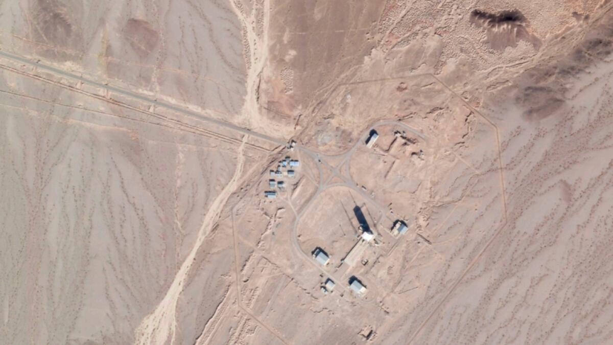In this satellite photo by Planet Labs Inc., activity is seen at the Imam Khomeini Spaceport in Semnan province, Iran. — AP file