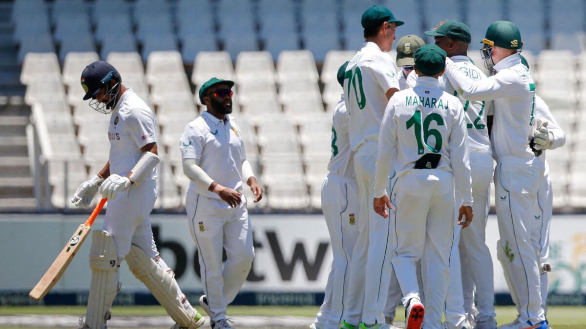 South Africa's cricketers celebrate after the dismissal of India's Cheteshwar Pujara. (AFP)