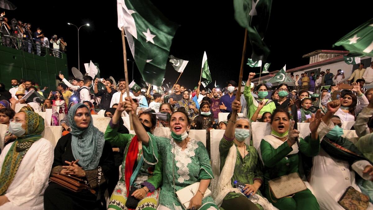 People cheer while watching fireworks during the Independence Day celebrations, in Karachi, Pakistan.  AP Photo