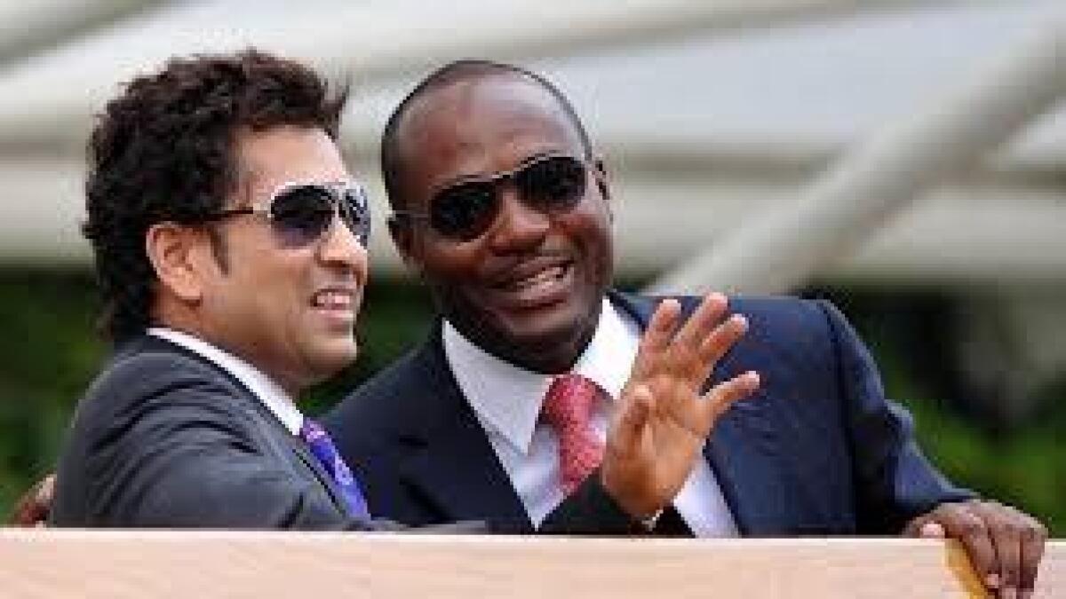 THE GREATS: Sachin Tendulkar (left) and Brian Lara. - AFP file