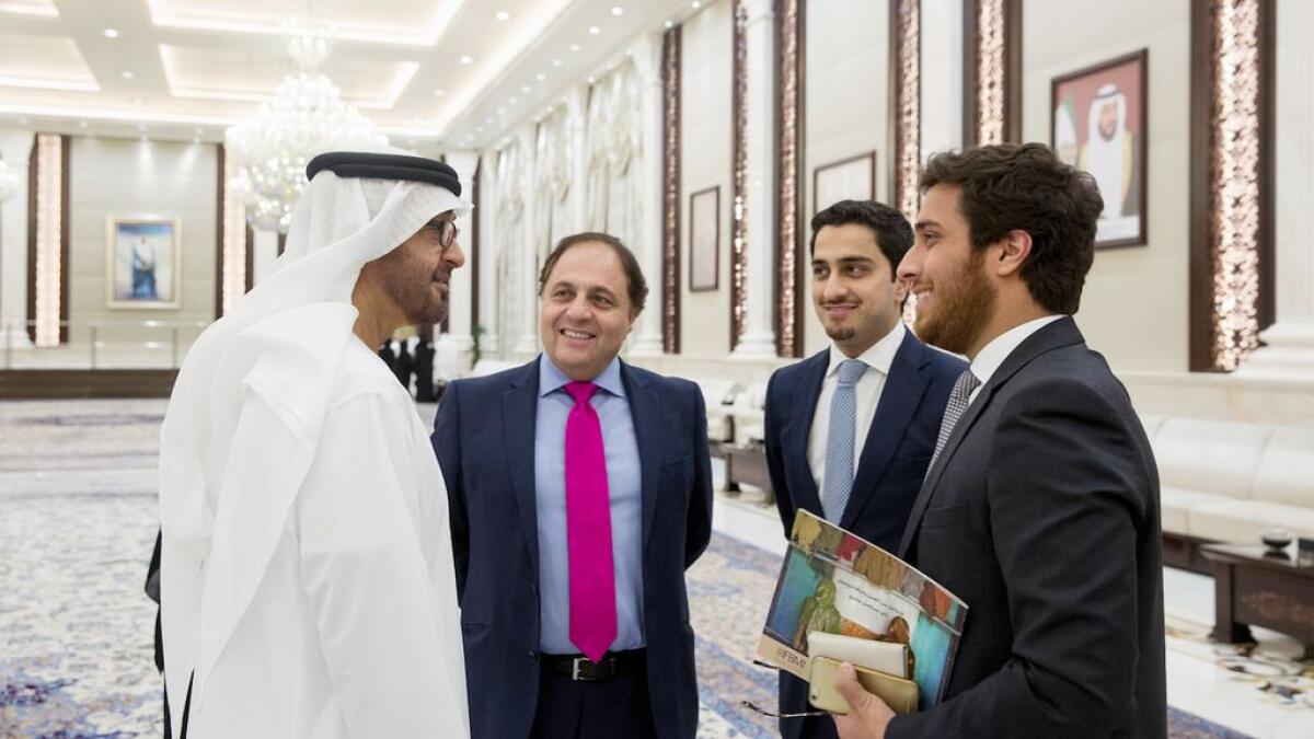 His Highness Shaikh Mohammed bin Zayed Al Nahyan, Crown Prince of Abu Dhabi and Deputy Supreme Commander of the UAE Armed Forces, speaks with Dawood Jabarkhyl (second from left), Chairman of Tanweer Investments and Fatima Bint Mohamed Bin Zayed Initiative; seen with Farshied Jabarkhyl.