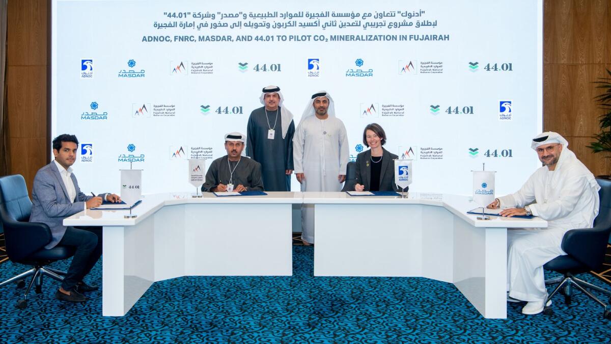 Talal Hasan, Ali Mohamed Ahmed Qasem, Sophie Hildebrand, and Mohammad El-Ramahi at the signing ceremony in Abu Dhabi on Tuesday. — Supplied photo