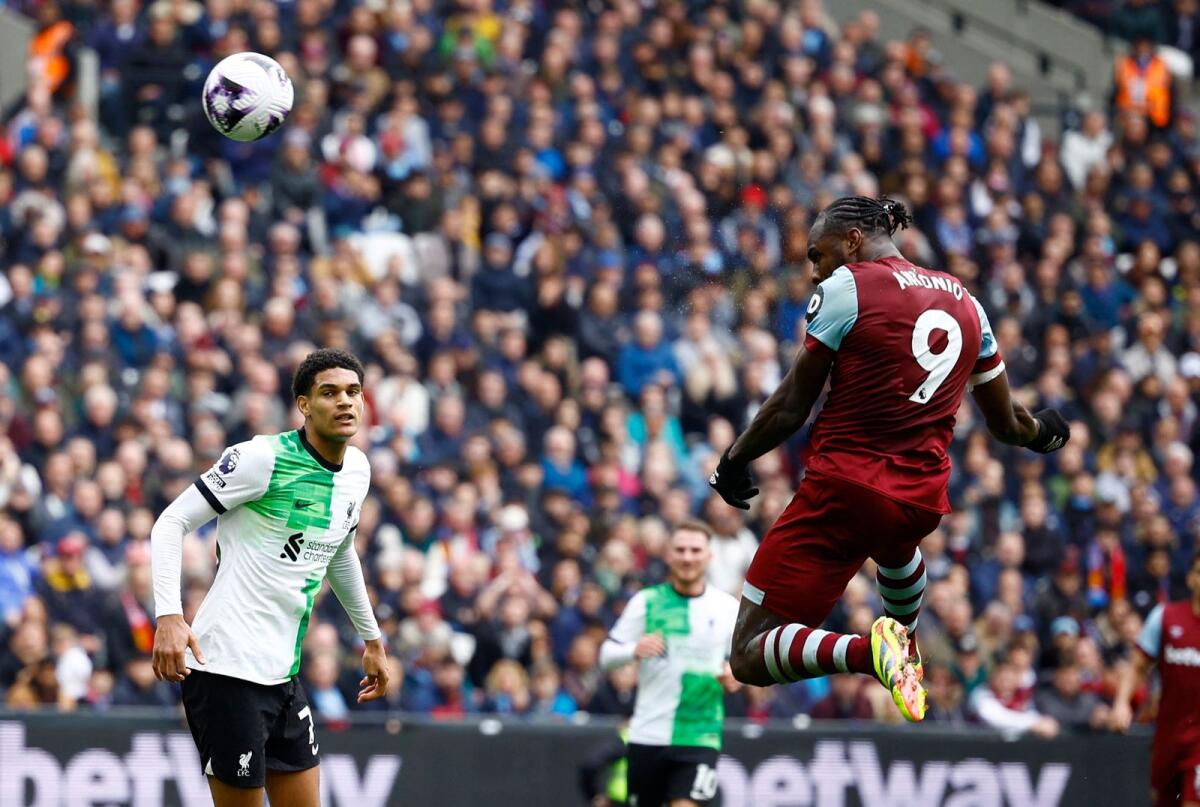 West Ham United's Michail Antonio scores the equaliser against Liverpool on Saturday. - Reuters