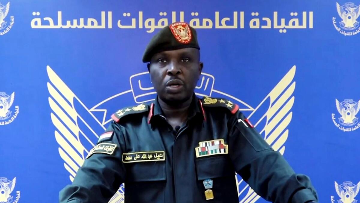 In this frame grab from a video posted by Sudan's state news agency SUNA on Thursday, Spokesman for the Sudanese Armed Forces Brig. Nabil Abdullah reads a statement warning of conflict after the recent deployment of Sudan's powerful paramilitary in the capital and other cities. — AP
