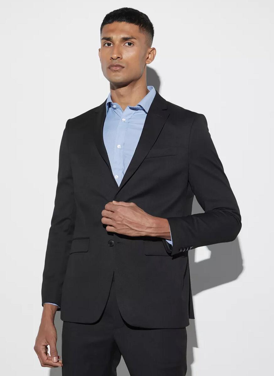 Mean business? Then opt for this blazer from the brand for all the meetings you're going to preside over. Priced at Dh174, the textured dobby blazer with notch lapel and flap pockets is stuff of pure elegance