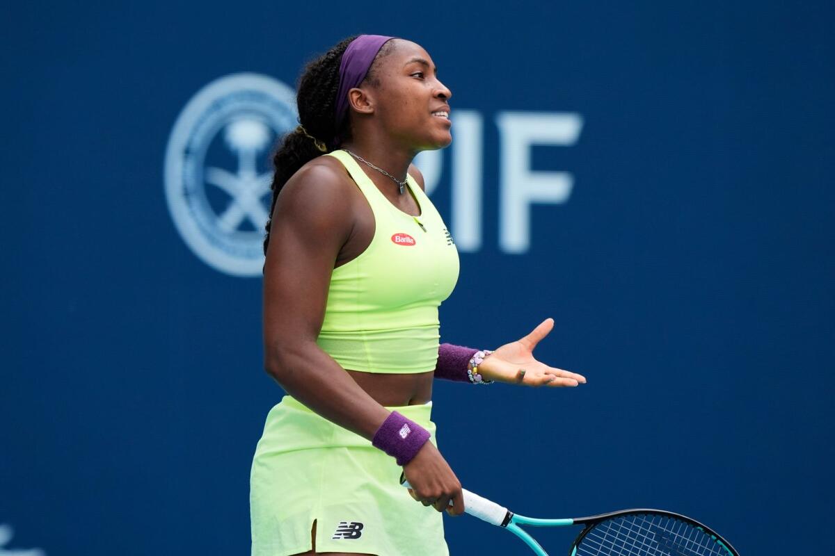 Coco Gauff reacts after losing a point to Caroline Garcia. — AP