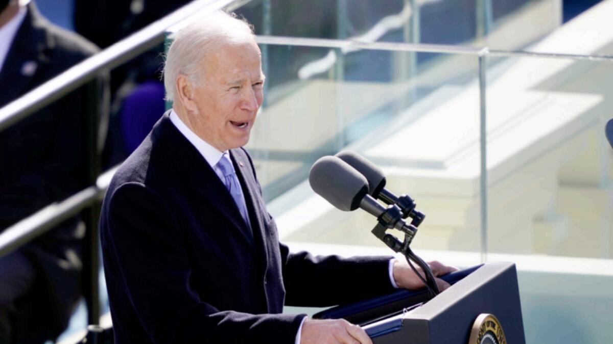Joe Biden speaks after the inauguration. — AP