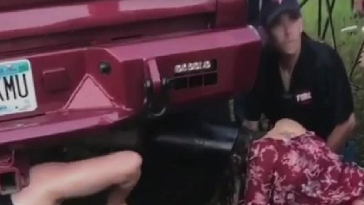 Video: Woman gets head stuck in truck exhaust pipe 