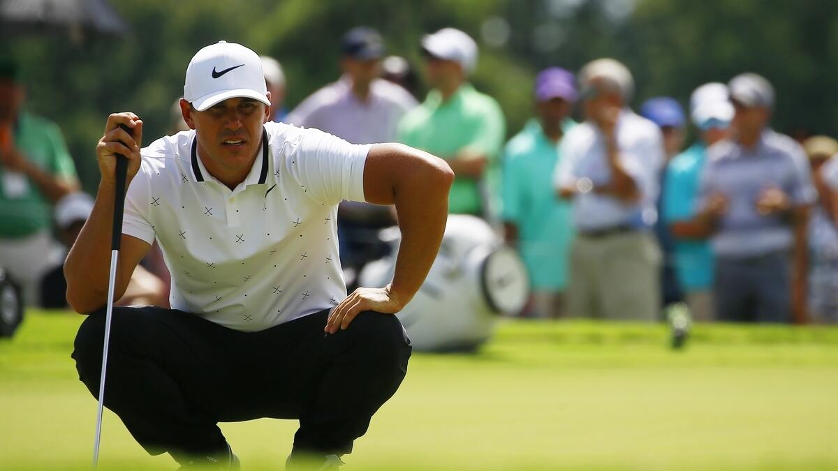 Late birdie lifts Koepka to Tour Championship lead