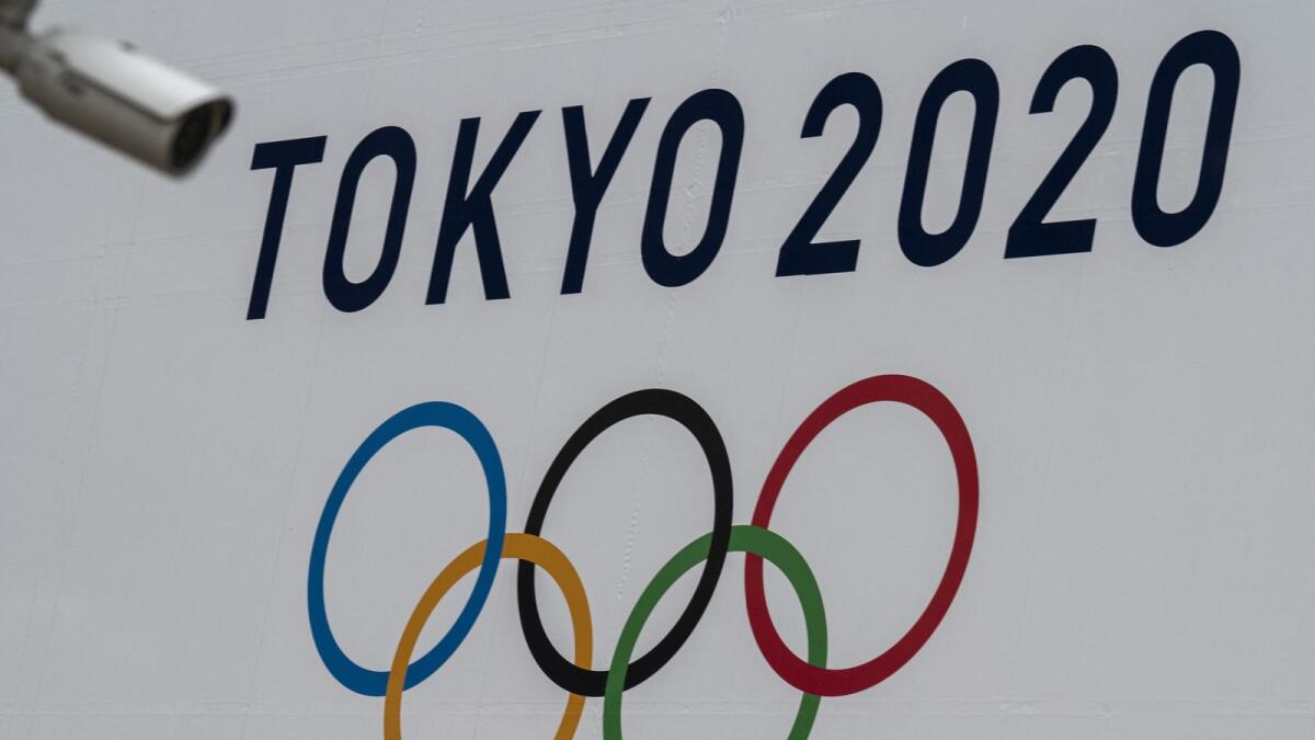 The Tokyo Olympics banner displayed on the wall of the metropolitan government building in Tokyo. (AFP)