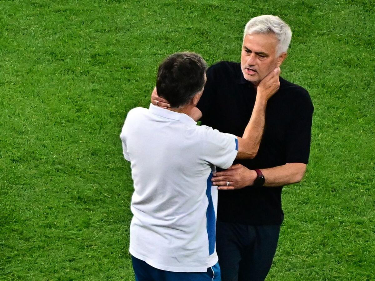 AS Roma coach Jose Mourinho shakes hands with Sevilla coach Jose Mendilibar after the match. — Reuters