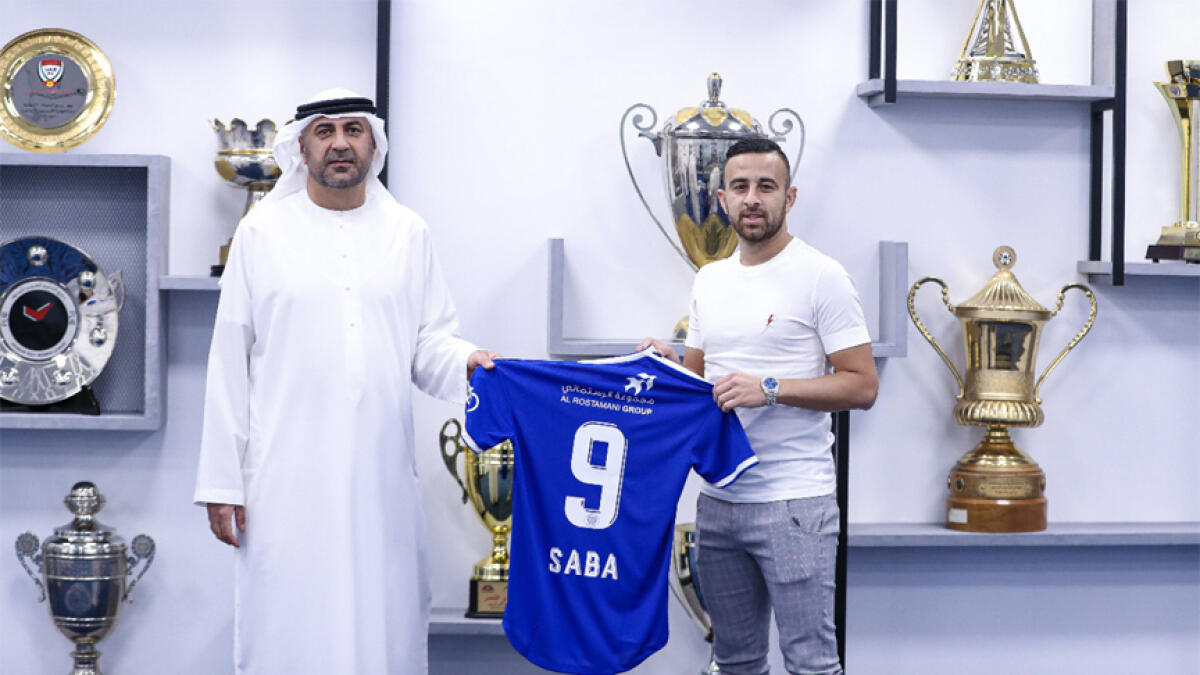 Diaa Saba, attacking Israeli midfielder, poses with his number 9 jersey. - Al Nasr Twitter