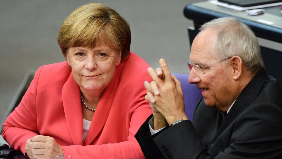 Germany throws support for bailout, EU pledges more cash