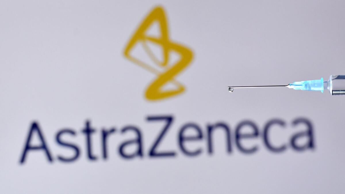 An illustration picture shows a drop from a syringe with the logo of British pharmaceutical company AstraZeneca on November 17, 2020. (Photo: AFP)