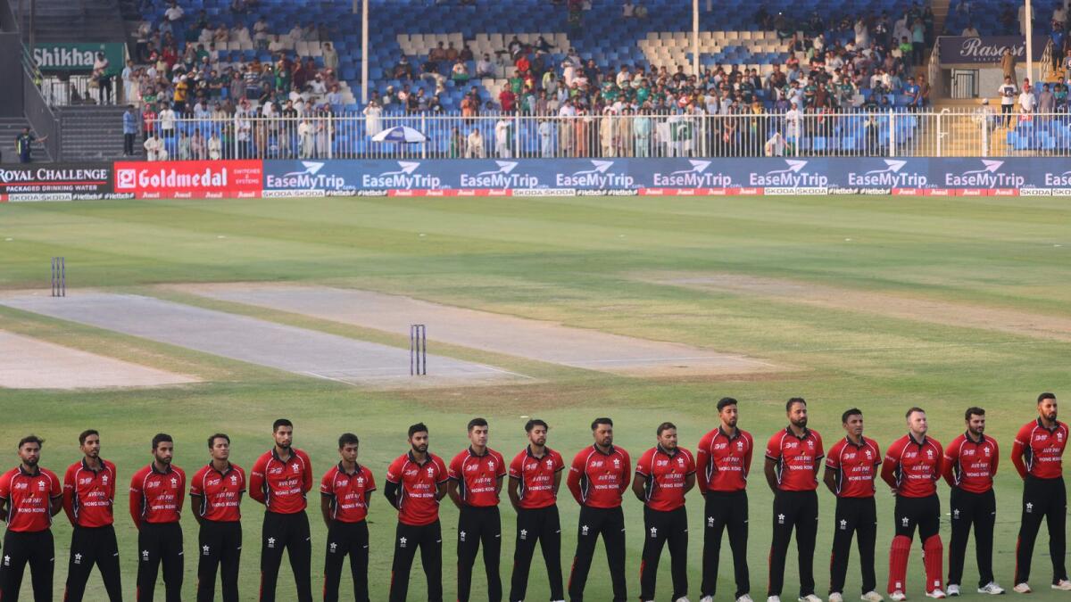 Hong Kong players sing their national anthem before the start of the Asia Cup match against Pakistan at the Sharjah Cricket Stadium. (AFP)