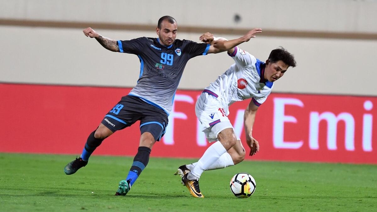 Sharjah wrap it up with win over 10-man Dibba