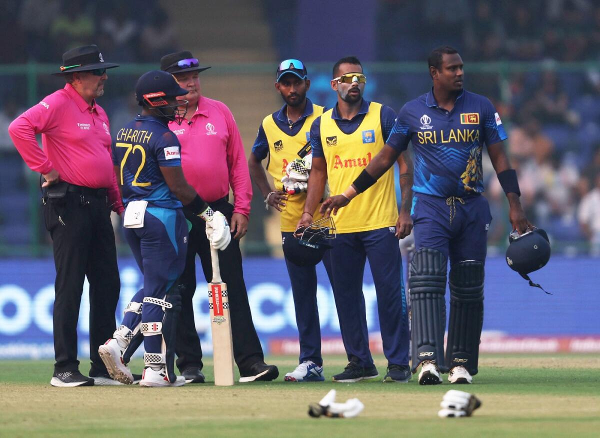 Sri Lanka's Angelo Mathews reacts after losing his wicket due to the time out rule. - Reuters File