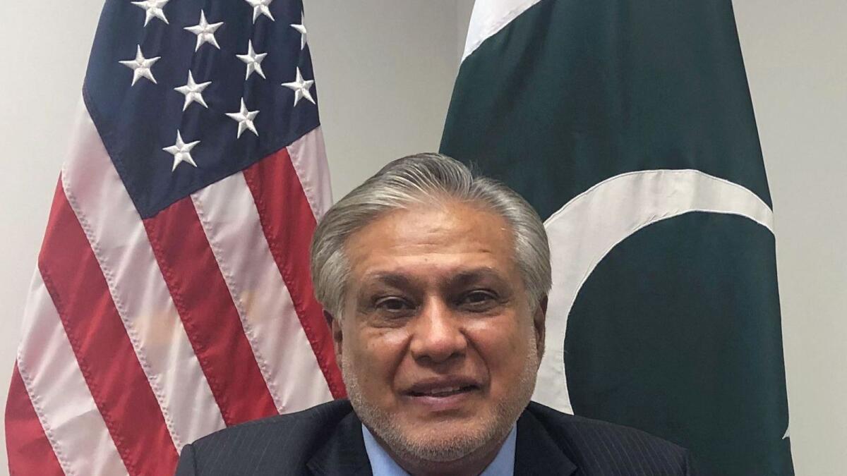 Pakistani Finance Minister Ishaq Dar says a recent Supreme Court order striking down plans to delay elections has compounded the political crisis. — AFP file