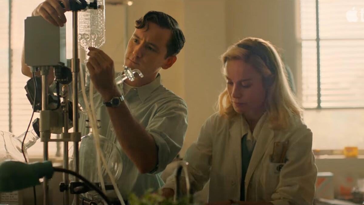 Lewis Pullman and Brie Larson in a scene from 'Lessons in Chemistry'