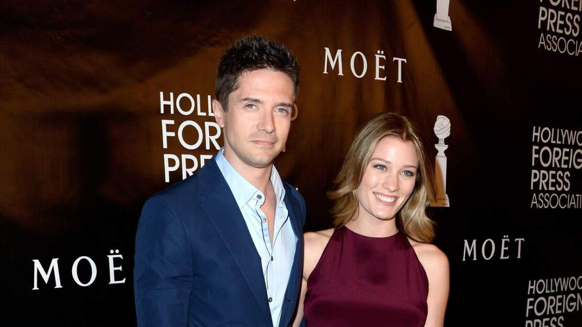 Topher Grace and Ashley Hinshaw.