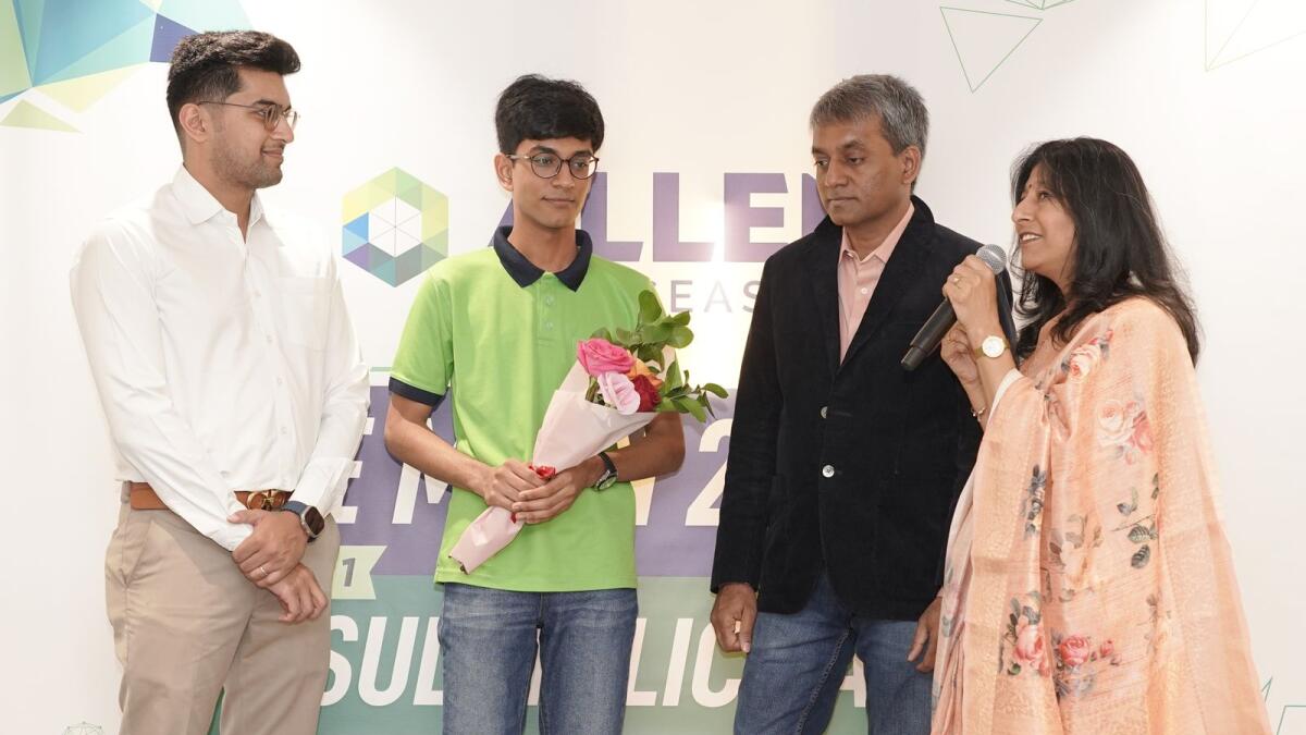 JEE Main 2024 Session 1 Outside India Topper Yatharth Shah with his parents at Allen UAE felicitation event.