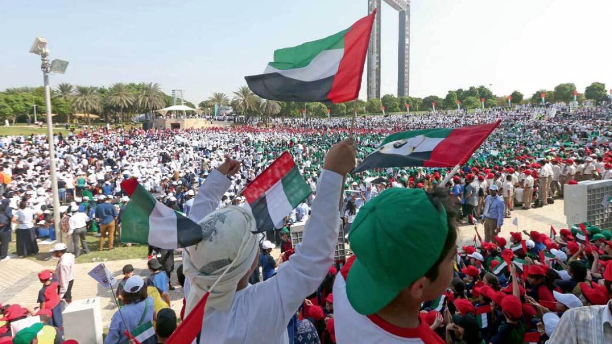 Sheikh Mohammed,  residents, raise, UAE flag, November 3, 