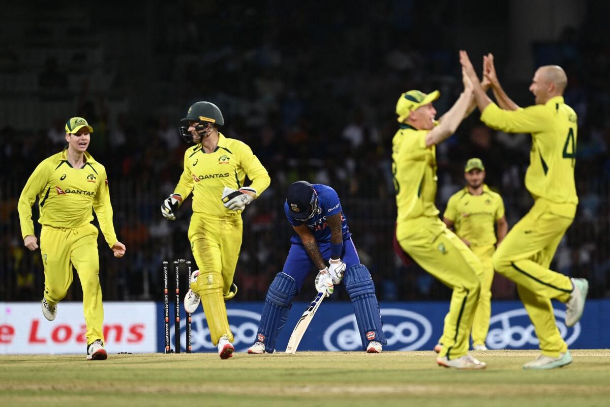 India's Suryakumar Yadav (centre) reacts after his dismissal during the third one-day international against Australia. — AFP