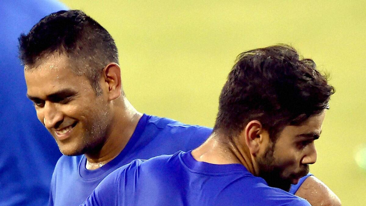 Indian captain Dhoni and Virat Kohli during their training session prior to the 2nd T20 match against South Africa. 