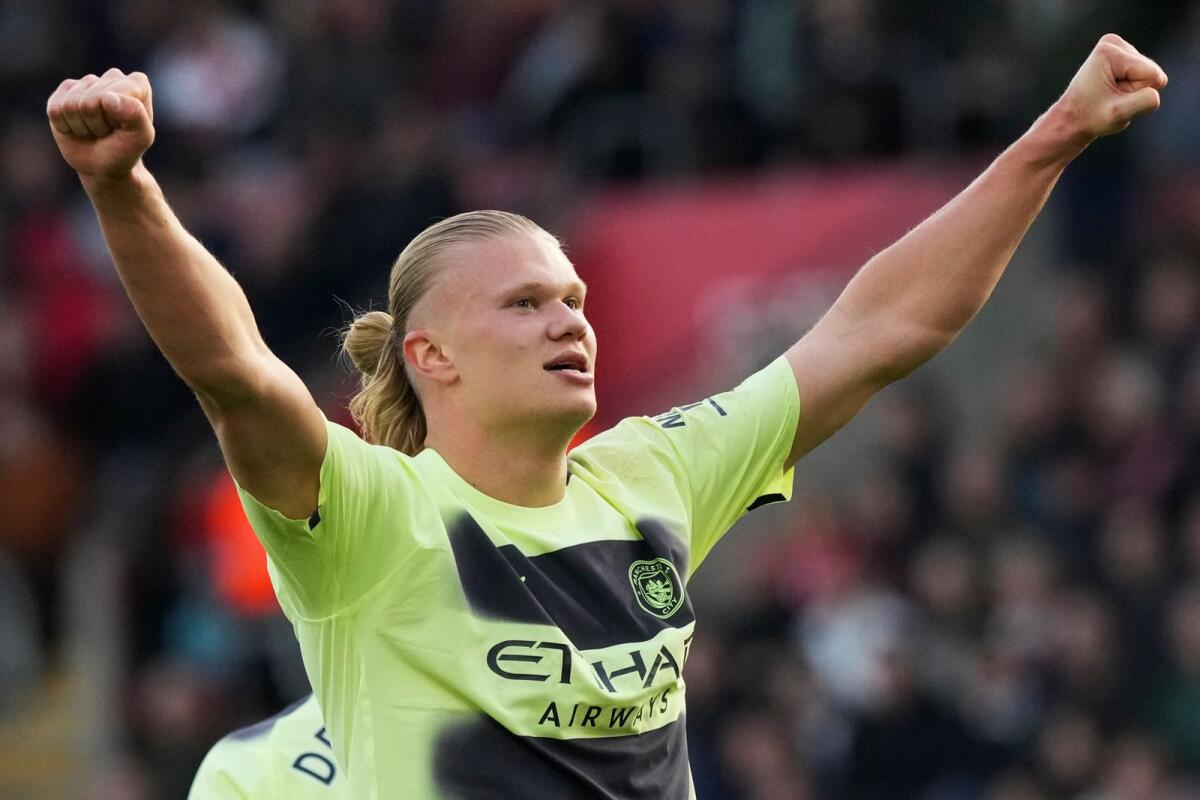 Manchester City's Erling Haaland celebrates after scoring his side's third goal against Southampton on Saturday. — AP