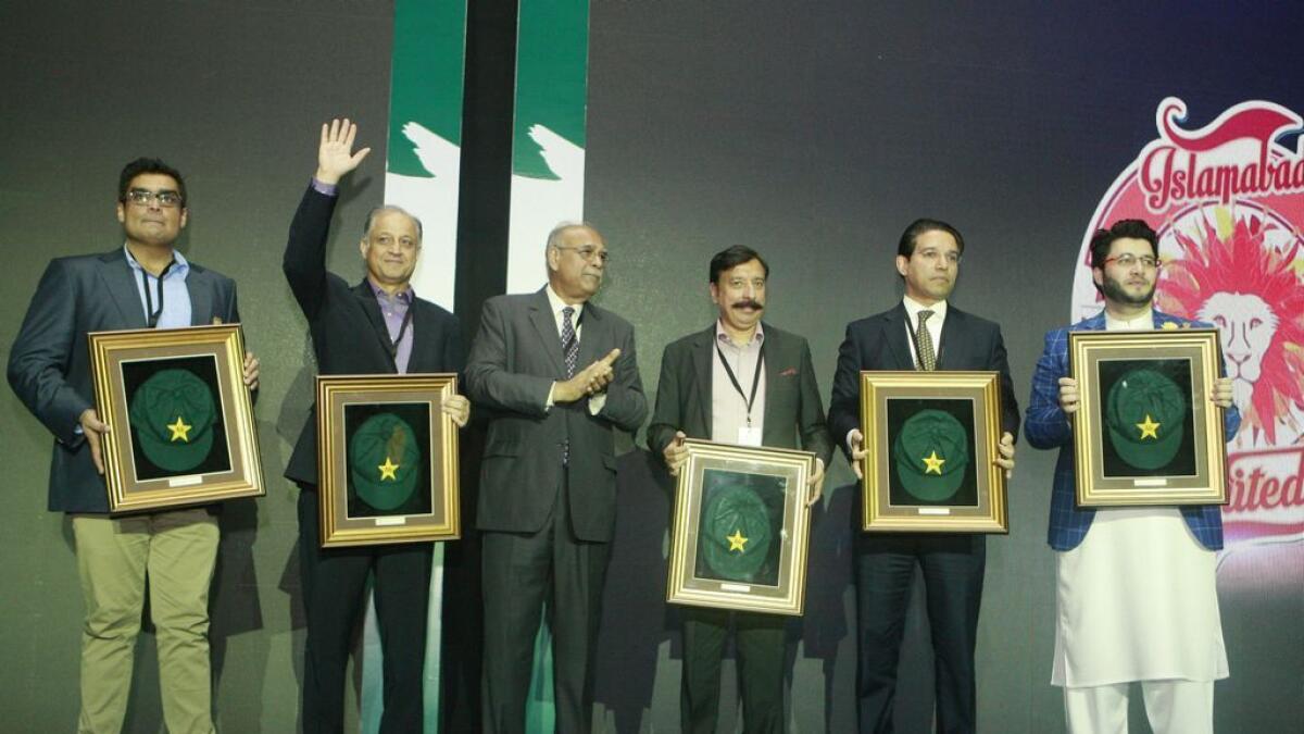 Najam Sethi (third from left), Chairman, Pakistan Super League with the team owners at the Pakistan Super League Draft held at The Dome, Dubai Sports City.