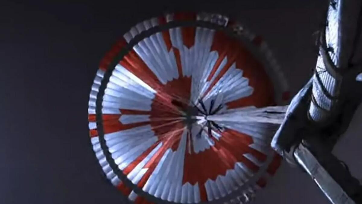 A video grab photo of the parachute used in the landing of NASA's Perseverance rover on Mars. AFP