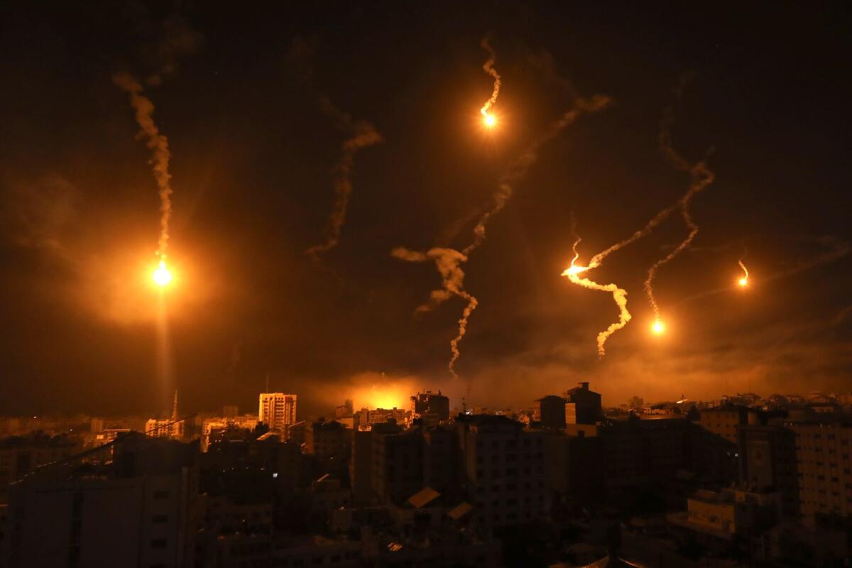 Israeli forces' flares light up the night sky in Gaza City, Monday, Nov. 6, 2023. Photo: AP