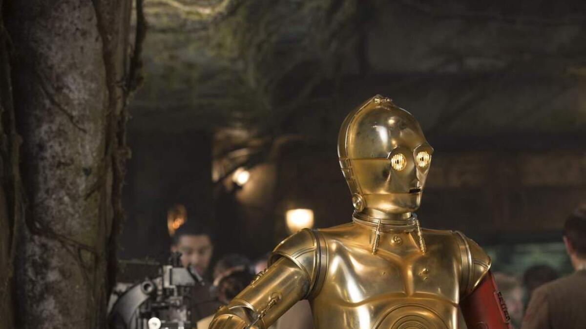 R2-D2 and Anthony Daniels as C-3PO, in Star Wars: The Force Awakens