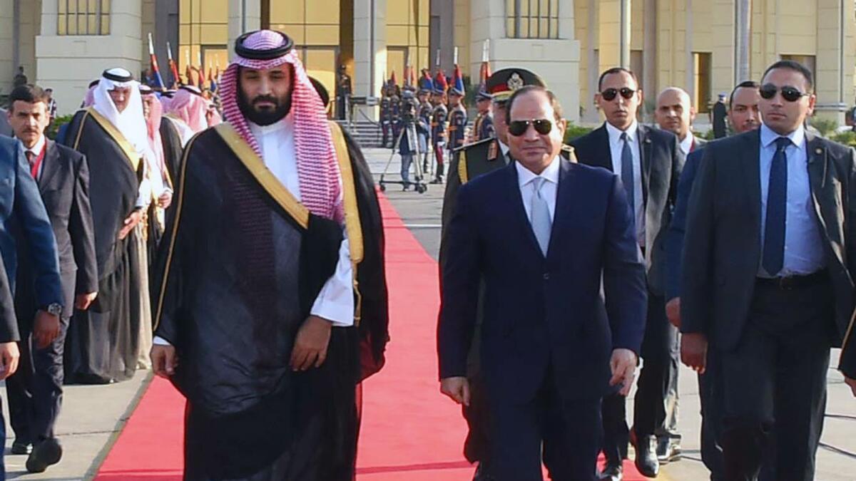 File. Egyptian President Abdel Fattah al-Sisi (C-R) walking alongside Saudi Crown Prince Mohammed bin Salman (C-L) during a ceremony bidding the latter farewell at Cairo International Airport.Photo: AFP