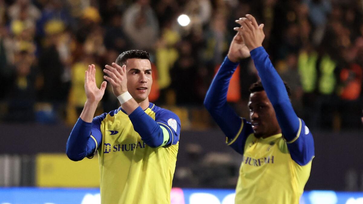 Cristiano Ronaldo applauds fans after the match. — Reuters