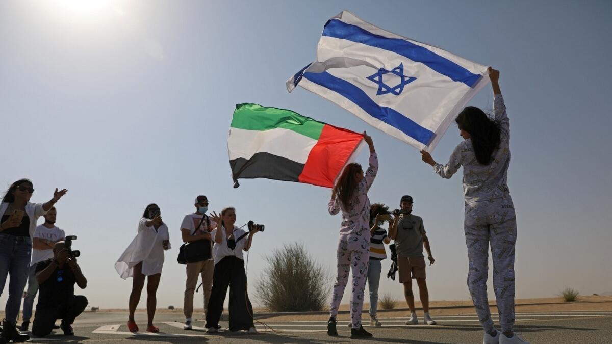 The UAE and Israeli flags flutter during the shoot. Photo: Reuters