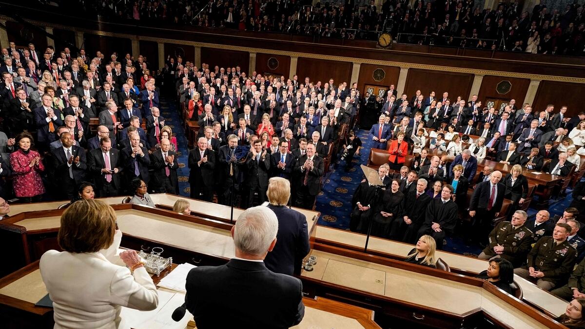 Seated in silence behind the president in the House of Representatives, Pelosi frowned, repeatedly shook her head and smiled disbelievingly until he finished speaking and Republicans erupted in applause — at which point she rose and very visibly tore up the papers in front of her.