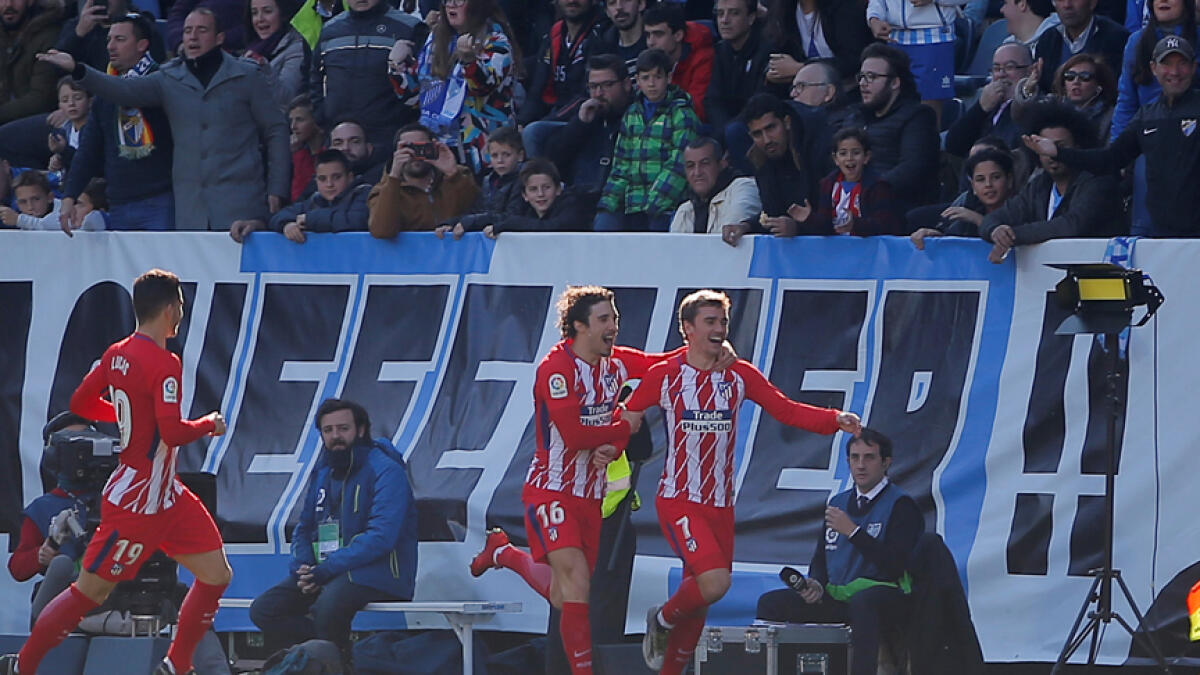 Griezmann nets Atletico Madrid winner against Malaga