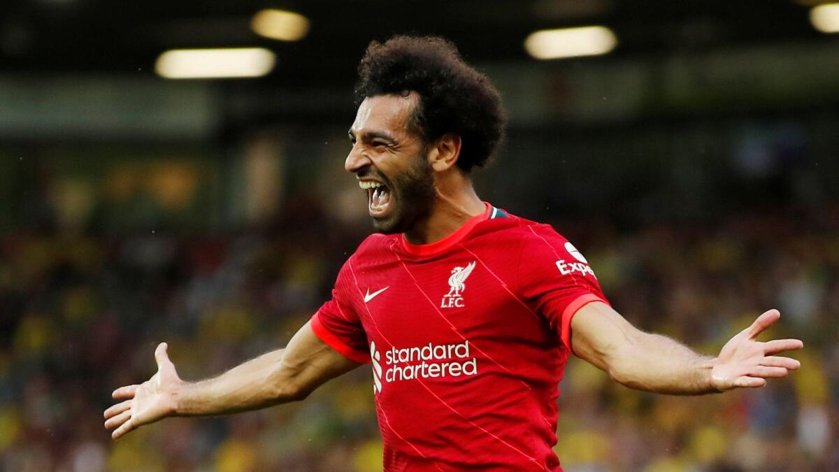 Liverpool's Mohamed Salah celebrates his goal against Norwich City. — Reuters