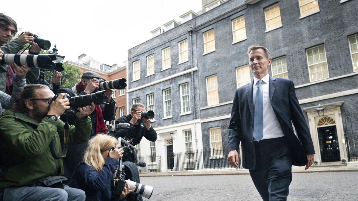 Jeremy Hunt leaves 10 Downing Street in London after he was appointed Chancellor of the Exchequer. — AP
