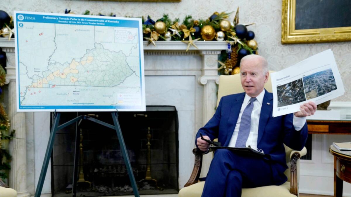 Joe Biden participates in a briefing with Homeland Security Secretary Alejandro Mayorkas on the federal response to tornado damage, in the Oval Office of the White House. — AP