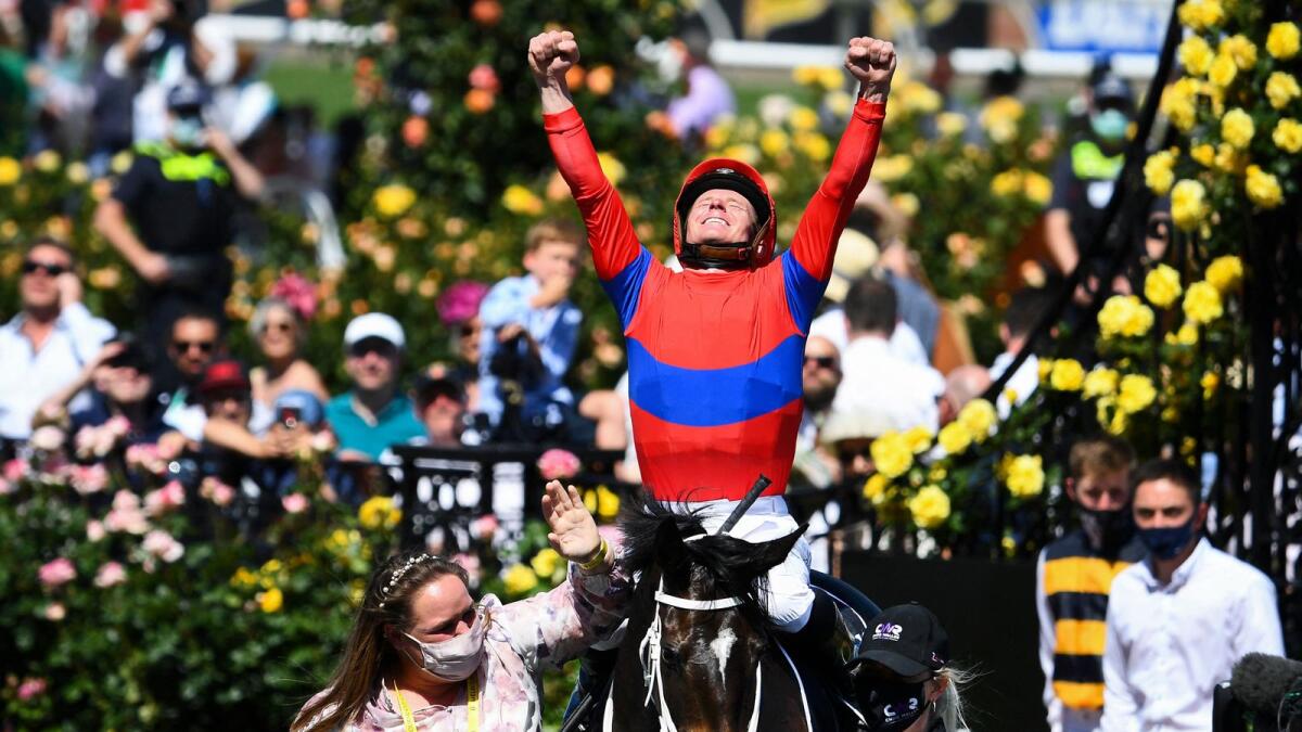 Jockey James McDonald reacts after guiding Verry Elleegant to victory at the Melbourne Cup on Tuesday. (AFP)