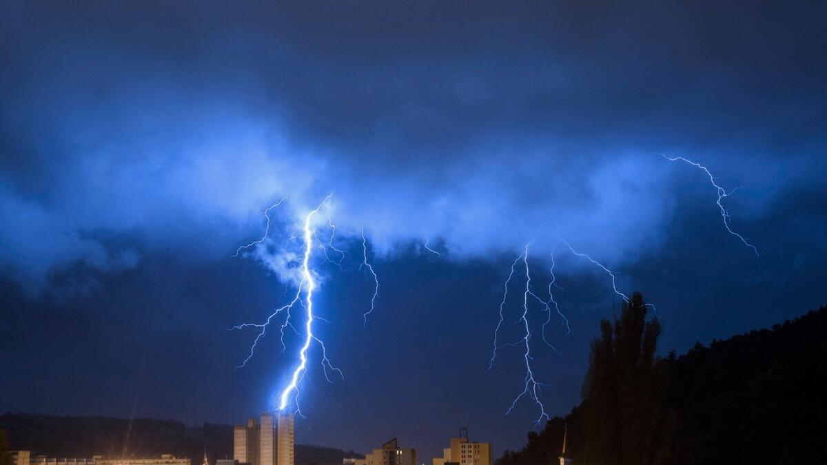 Lightning bolts illuminate the sky during a morning storm over Salgotarjan, Hungary. Photo: AP